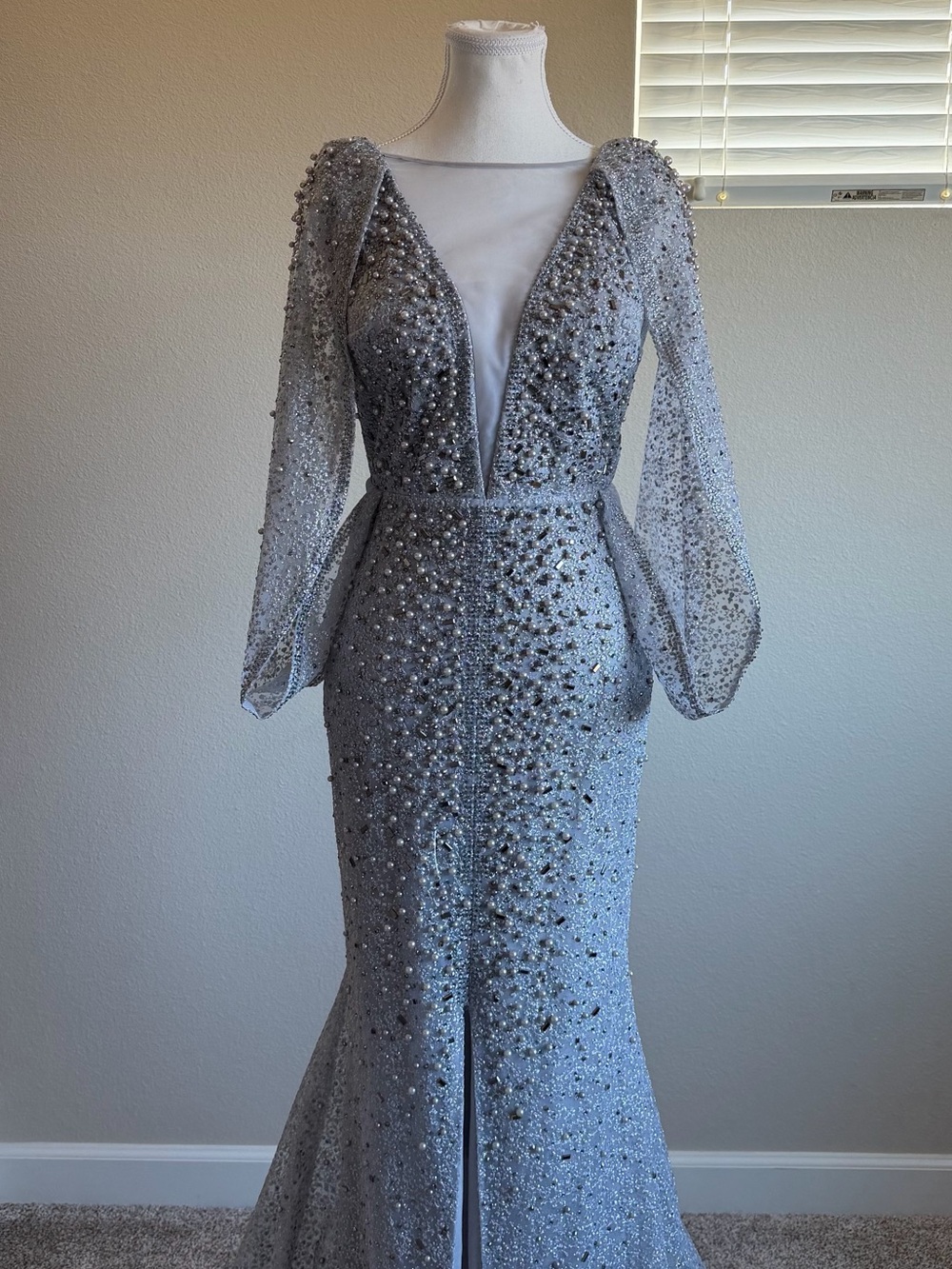 Embellished Silver Evening Gown with Plunging V-Neck